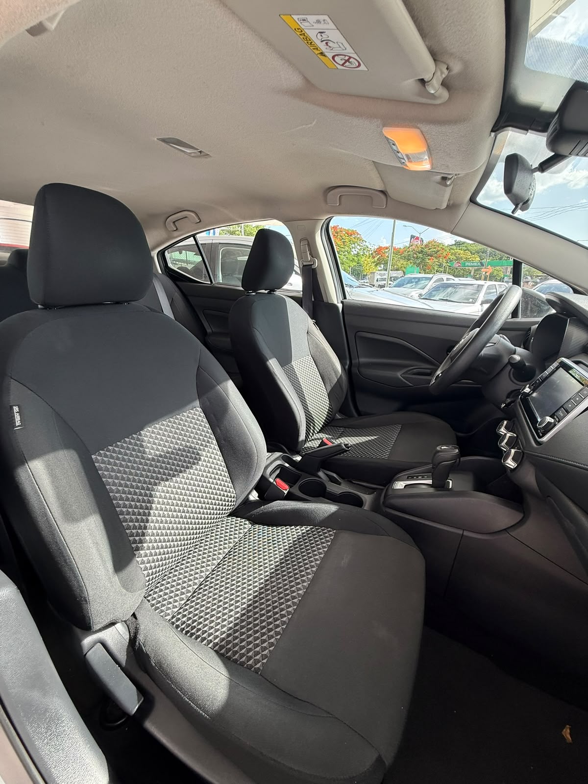 2024 NISSAN Versa 4 pts. Sense, TM5, a/ac., R-15