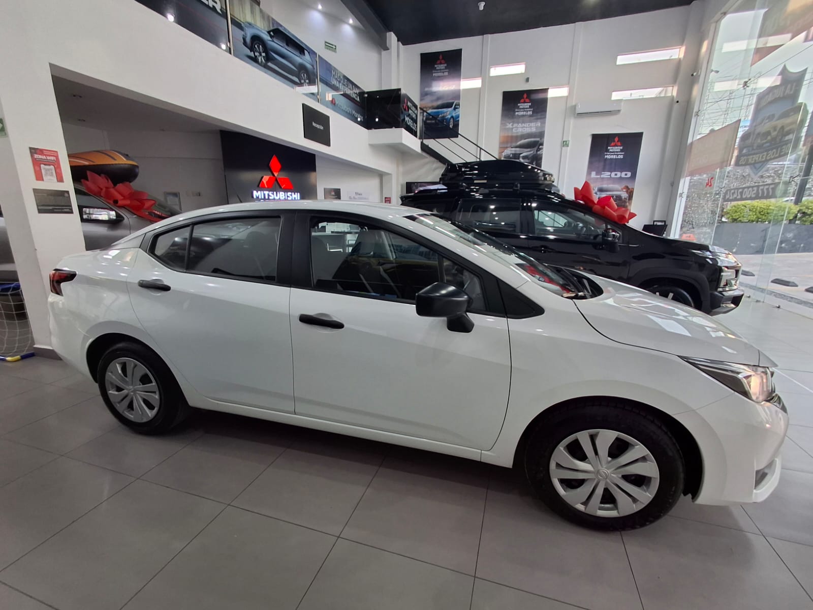 2025 NISSAN Versa 4 pts. Sense, TM5, a/ac., R-15